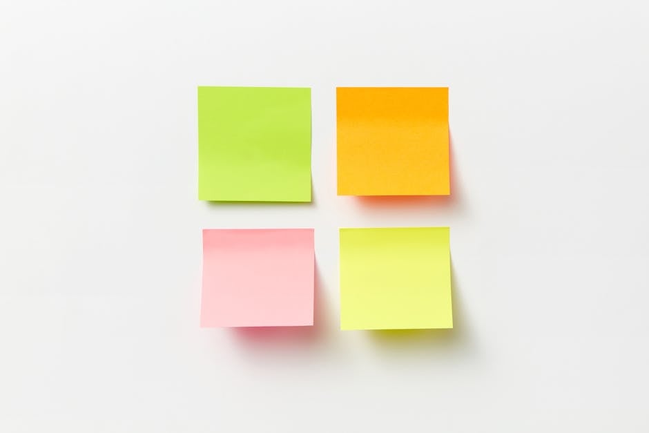 Four colorful sticky notes arranged on a clean white background.